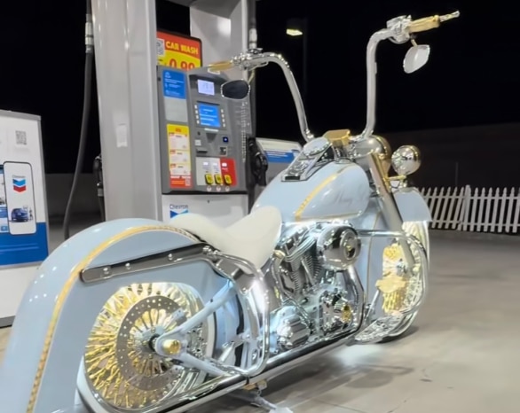 Stacee Bernard's HD 07 Softail DLX at the gas station